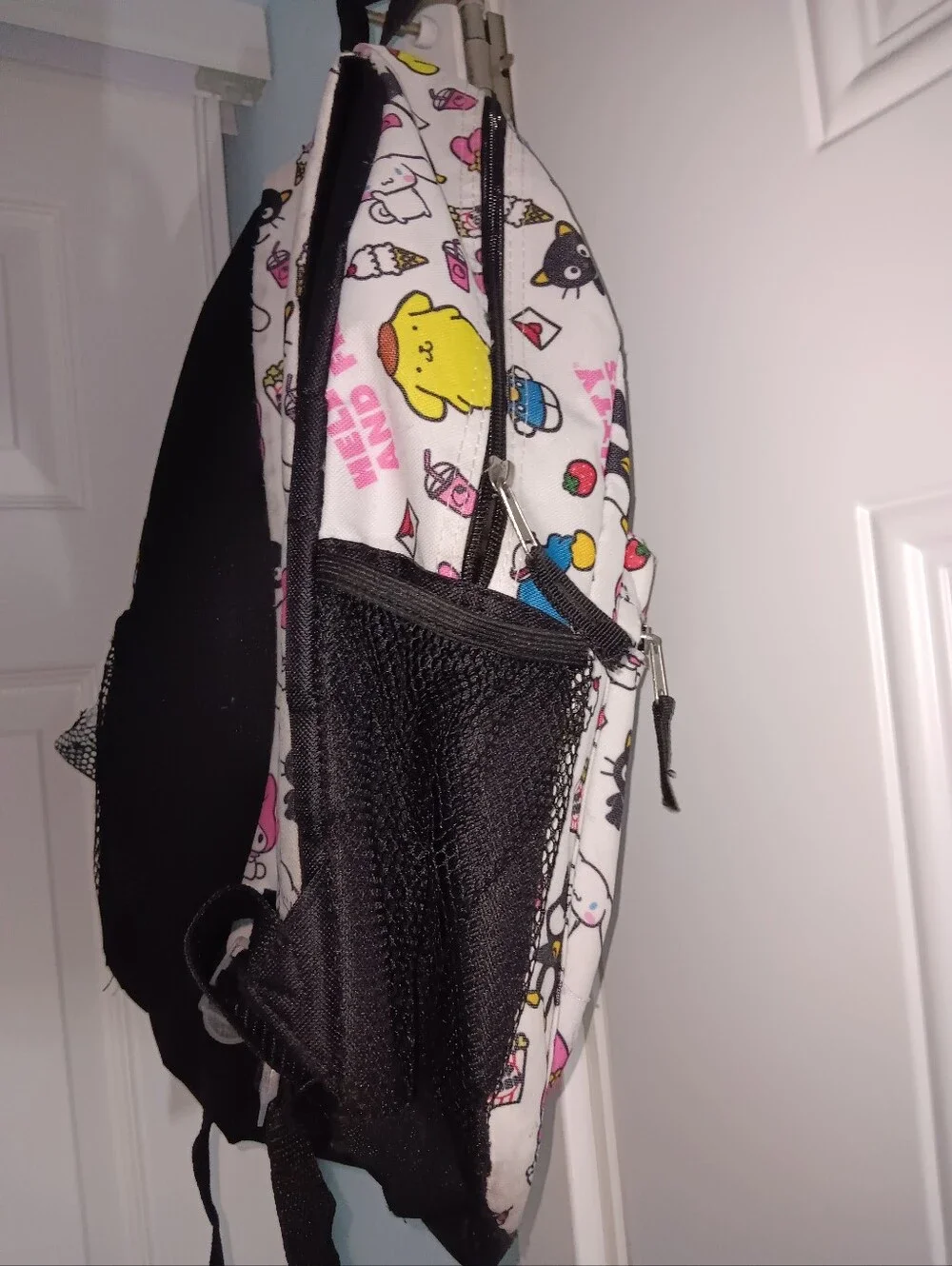 Sanrio White Backpack with Pink, Blue, Yellow and Black Character Print